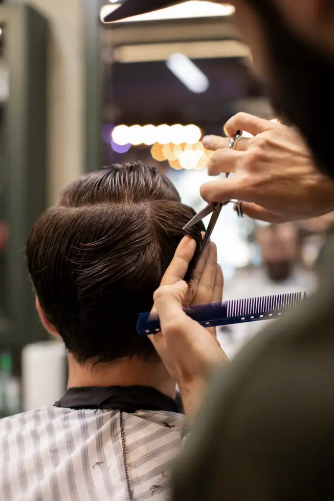 hairdresser-cutting-man-s-hair-barber-shop-scaled